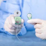 Surgeon holding TICI